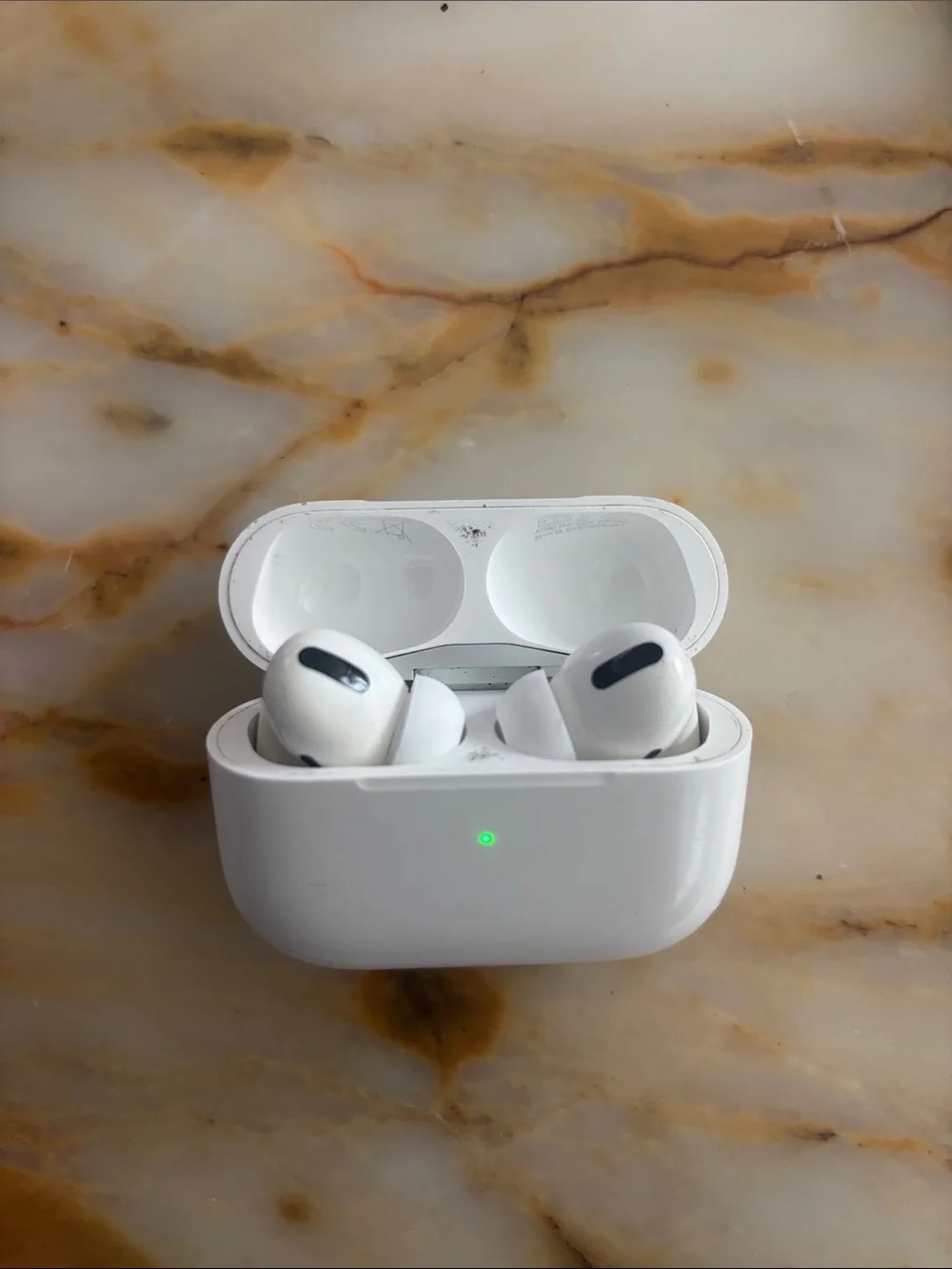 1st gen AirPods. New large ear pieces. And Charging Case - White